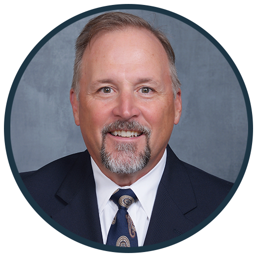 John N. Athans, DDS, smiling professional portrait, part of the Westermeier Martin Dental Care team dedicated to dental excellence and patient care.