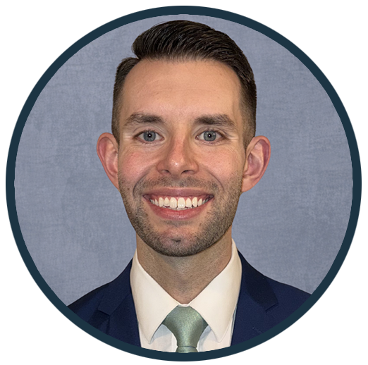 Dr. Jacob Graca, DDS, smiling in professional attire, representing Westermeier Martin Dental Care's commitment to quality dental care and patient relationships.